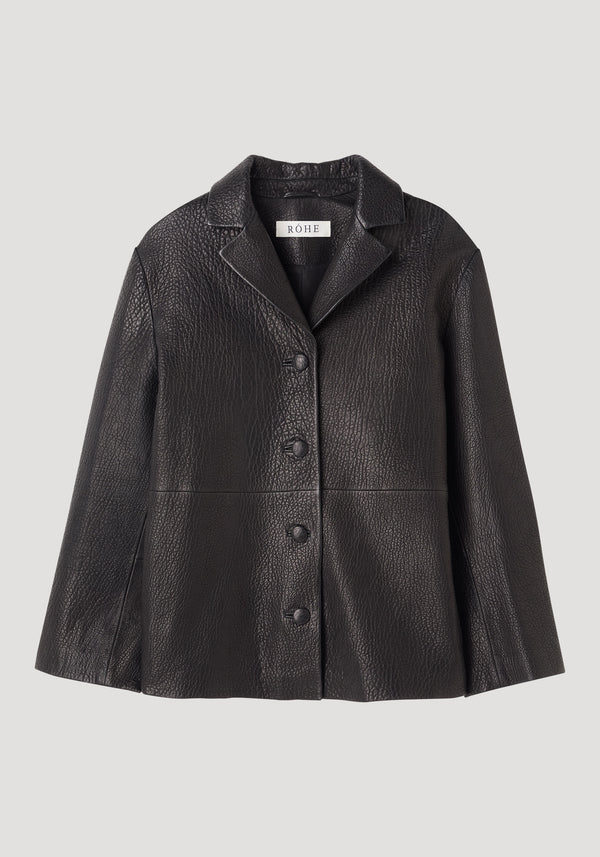 Leather jacket with small lapel in black, featuring a notch collar, four buttons, flared hem, and side-seam pockets, crafted from heavy-grain lamb leather.