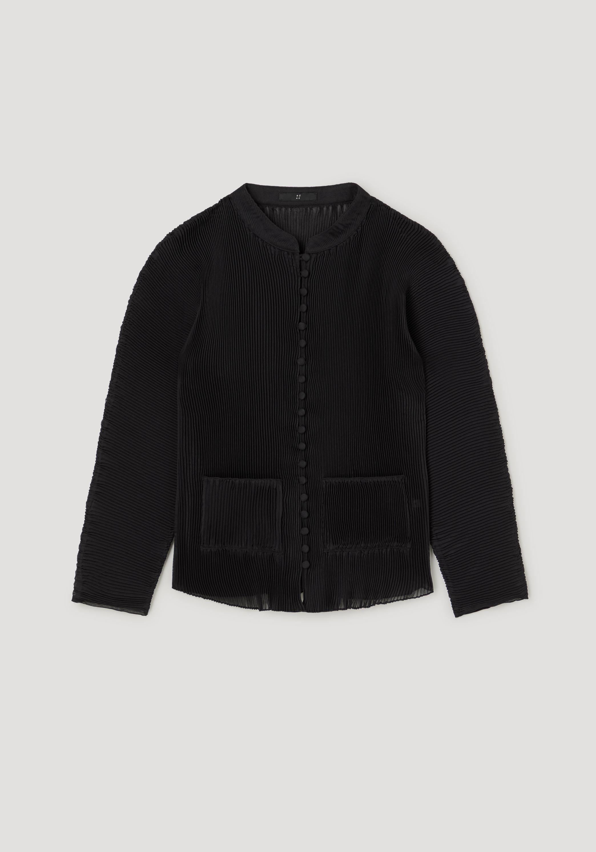 Plissé cardigan | black textured with long sleeves, round neckline, front fabric-covered button closure, and two patch pockets on the front.