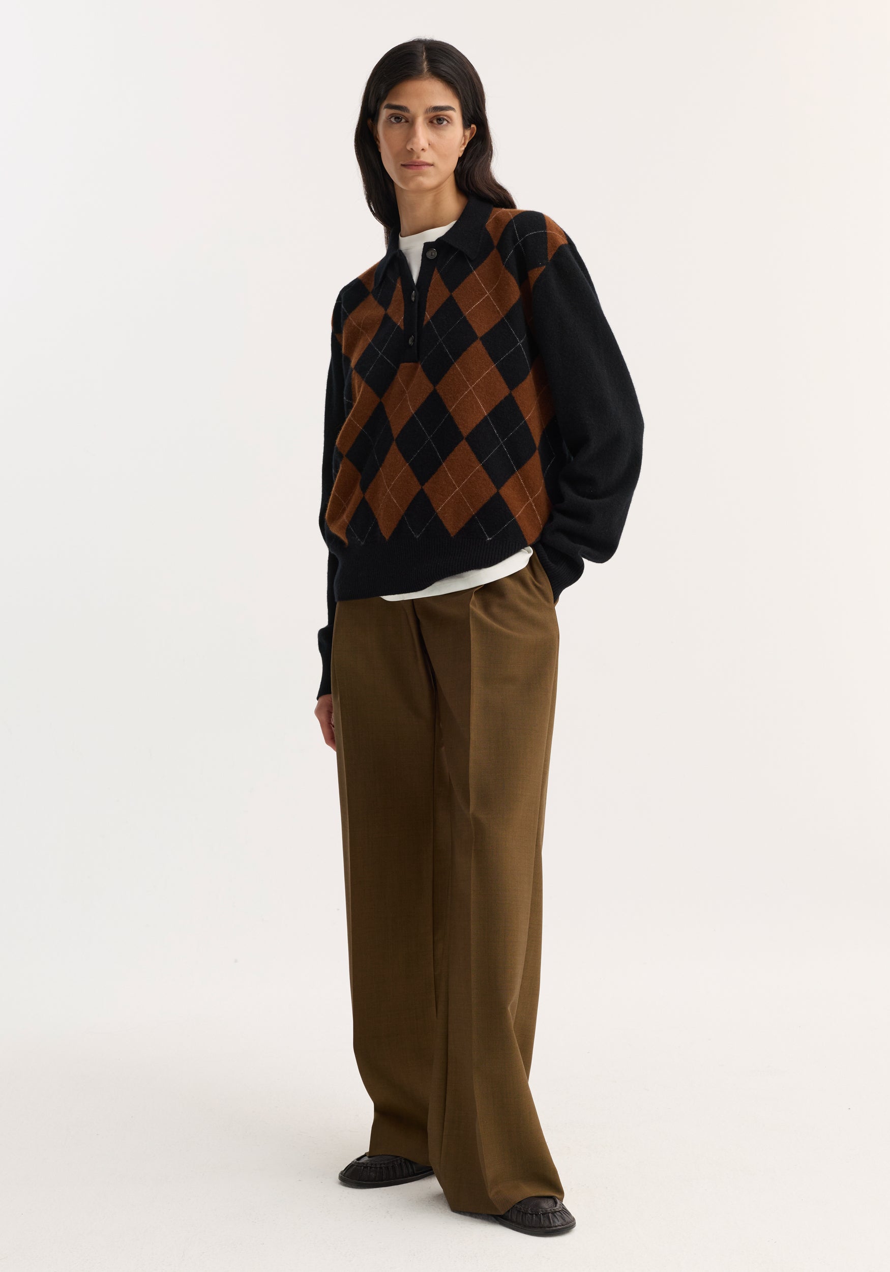 Compact knitted check polo | black rust check