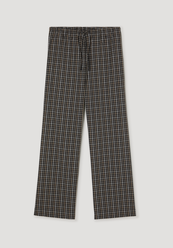 Relaxed fit trousers in black/brown check pattern, full-length with wide legs, elasticated drawstring waistband, and side seam pockets, made from 100% cotton.