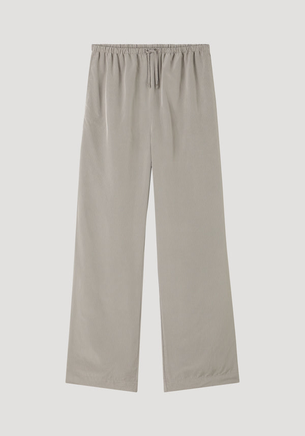 Relaxed fit trousers in light grey stripes featuring a wide-leg design, elastic drawstring waistband, and side seam pockets, crafted from soft viscose for everyday wear.