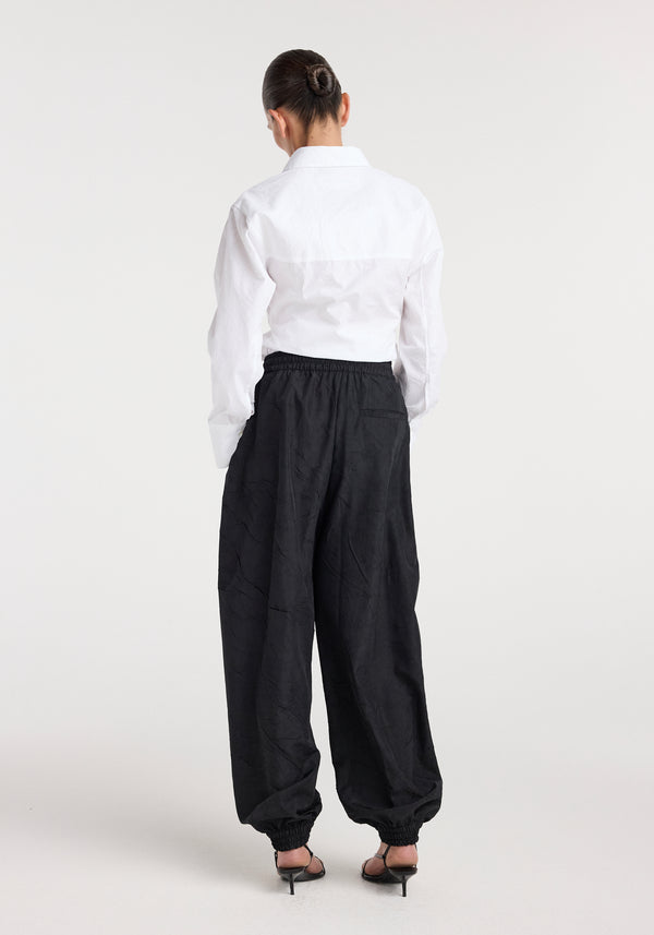 Balloon track pants | black