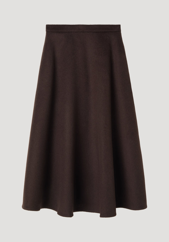 A-line skirt in dark brown, featuring a midi-length voluminous silhouette, side pockets, and seamless zipper closure, crafted from recycled wool blend.