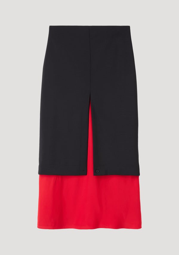 Contrast upside-down skirt | black features a knee-length black overlay with a center slit, revealing a bold red under-skirt, tailored for a striking silhouette.