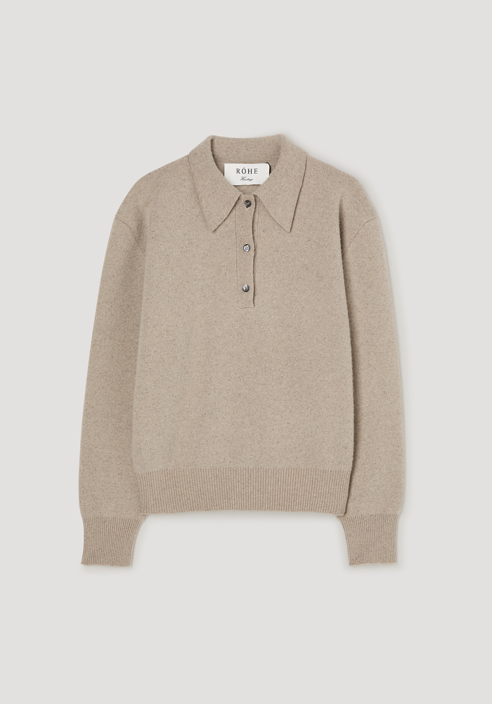 Wool cashmere polo in stone melange with a structured collar, three-button placket, and ribbed cuffs, made from a soft wool-cashmere blend.