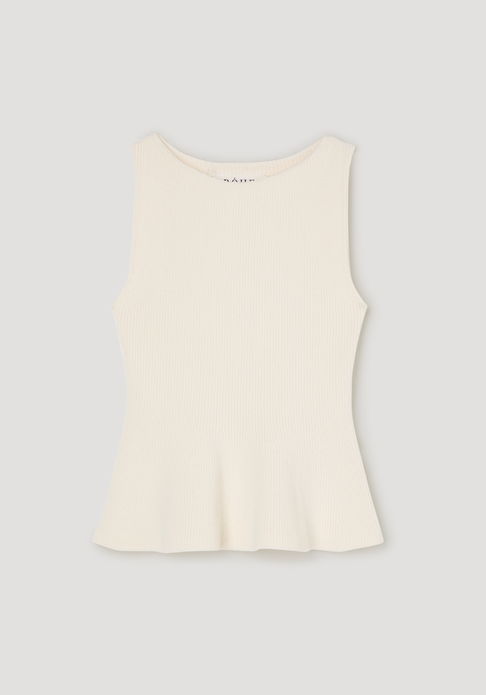 Sculptural knitted top | cream: Ivory-cream sleeveless top with a boat neckline, fine ribbed texture, and subtle peplum flare, crafted from organic cotton knit.
