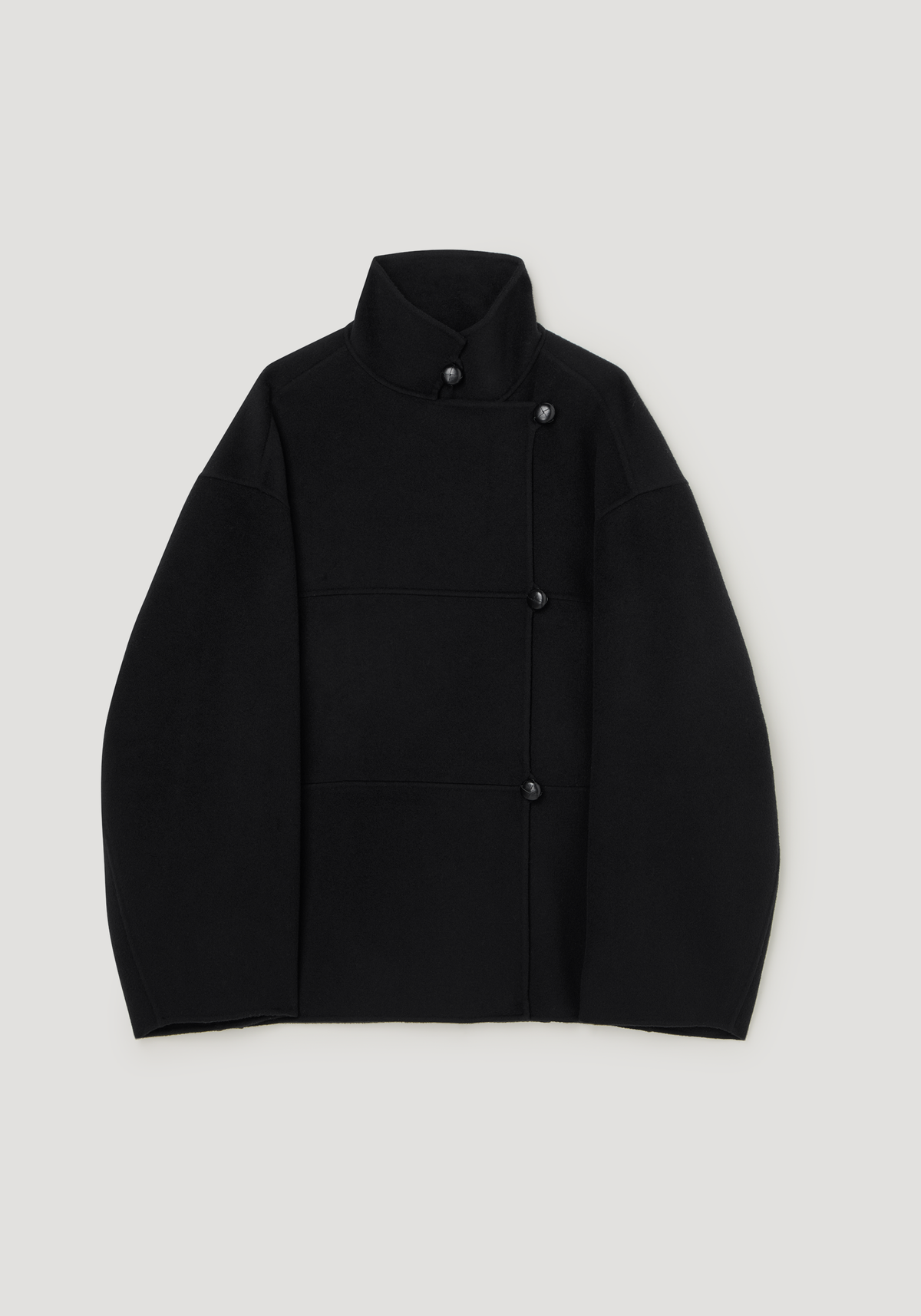 Double-faced wool jacket | black laid flat showing a high stand collar long sleeves and a minimalist button front silhouette