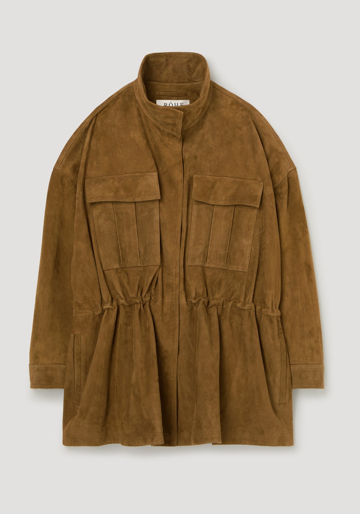 Sculptural suede jacket | sage shown flat with a stand collar zip front flap pockets long sleeves and a cinched waist in brown suede