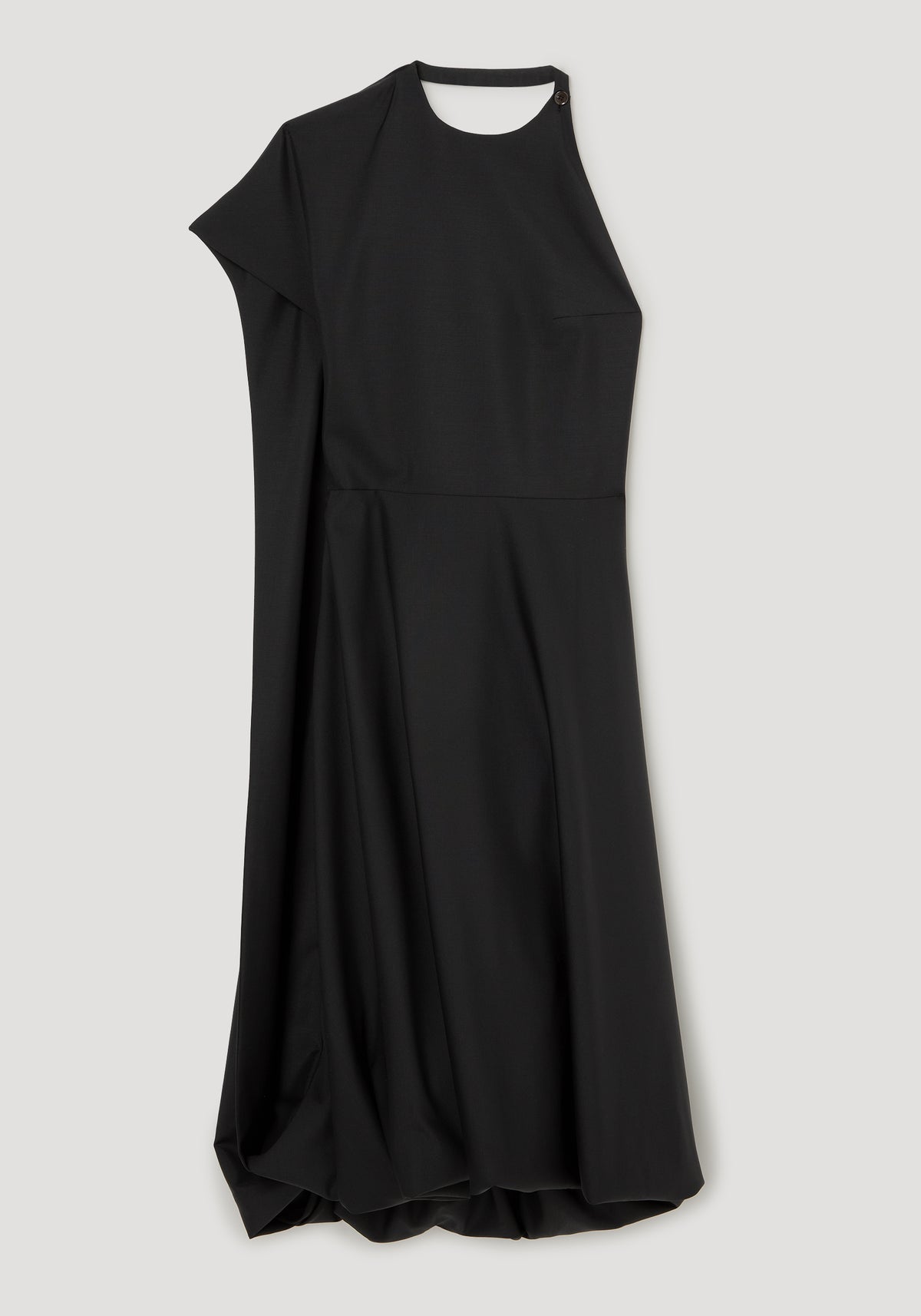 Twisted cape dress | black shown hanging with an asymmetric draped cape overlay, high neckline, defined waist and flowing ankle length skirt