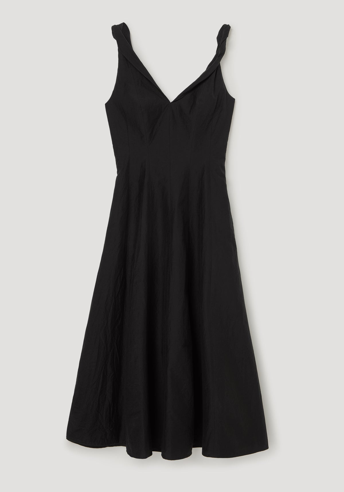 Twisted shoulder dress | black with twisted straps, V neckline, fitted waist, and flowing full length skirt displayed against a neutral background