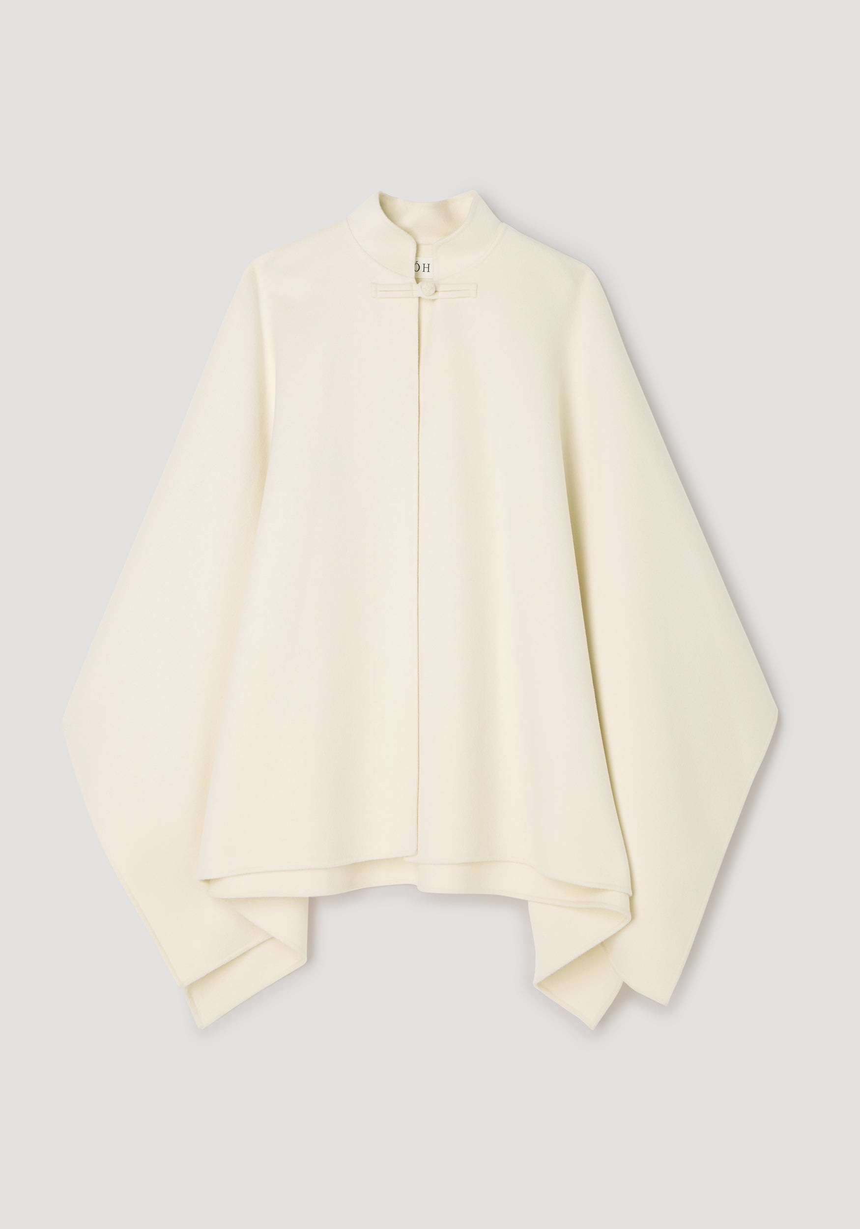 Double-faced pankou poncho | off white displayed flat, featuring a minimalist design with a stand collar and a traditional pankou knot closure at the neck.