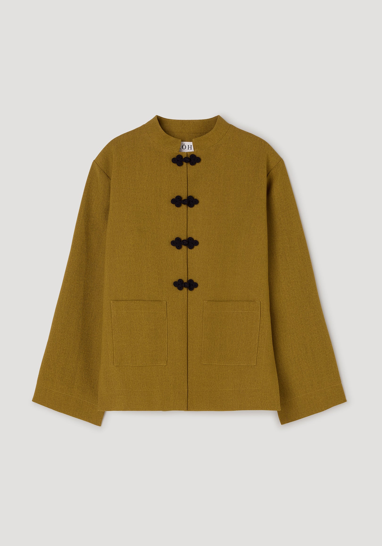 Pankou closure jacket | mustard in a loose fit with long sleeves, featuring four decorative black pankou knot closures and two front patch pockets on a plain background.