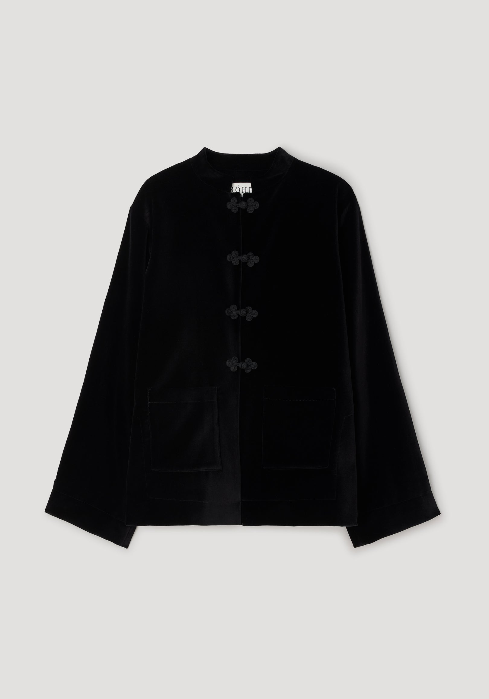 Pankou closure velvet jacket | black with traditional knot buttons down the front, long sleeves, patch pockets, and a soft, smooth texture ideal for elegant layering.