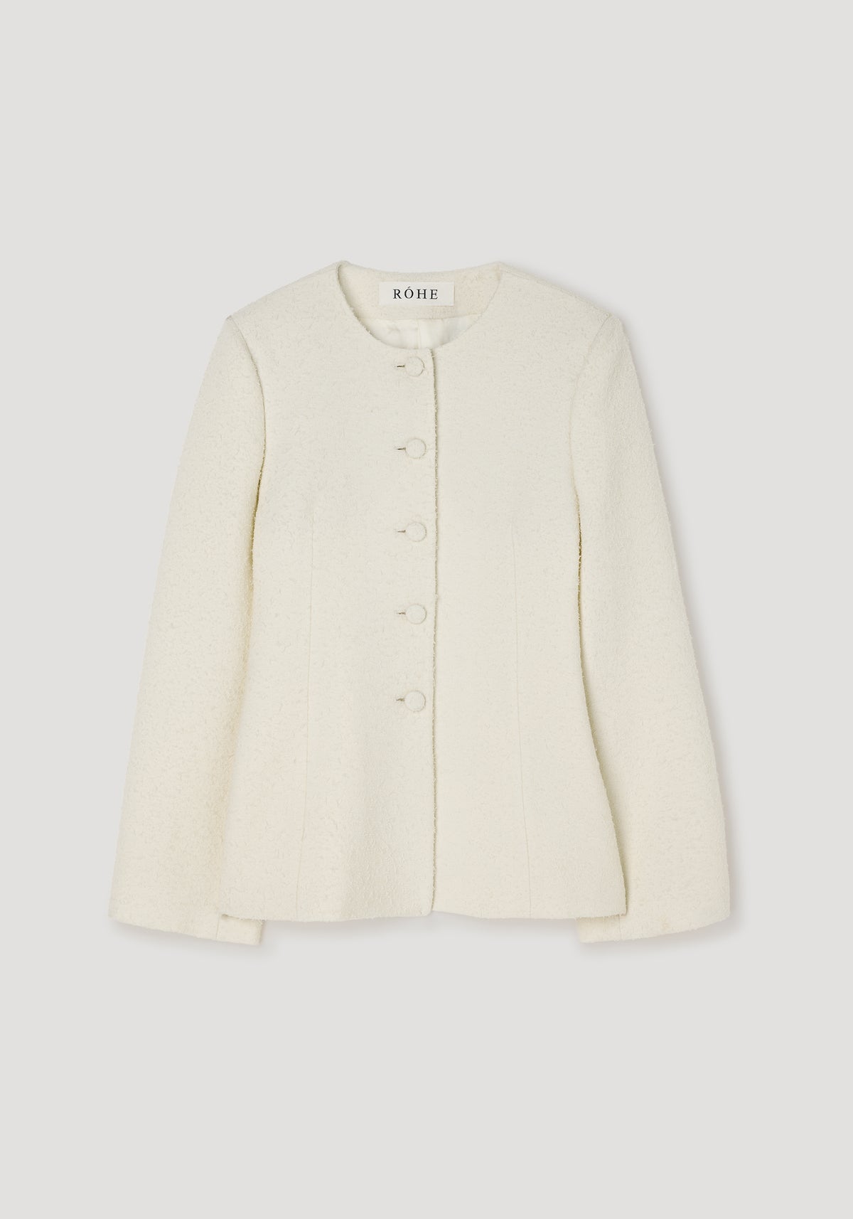 Bouclé shaped blazer | cream with round neckline, long sleeves, and front button closure, featuring a textured fabric and tailored fit.
