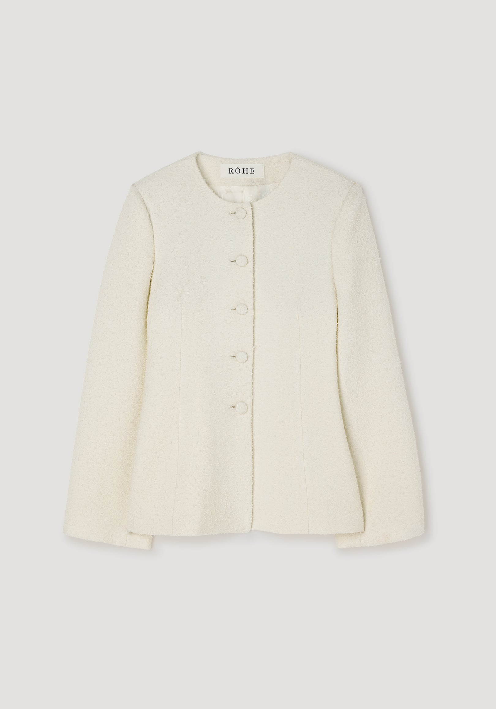 Bouclé shaped blazer | cream with round neckline, long sleeves, and front button closure, featuring a textured fabric and tailored fit.