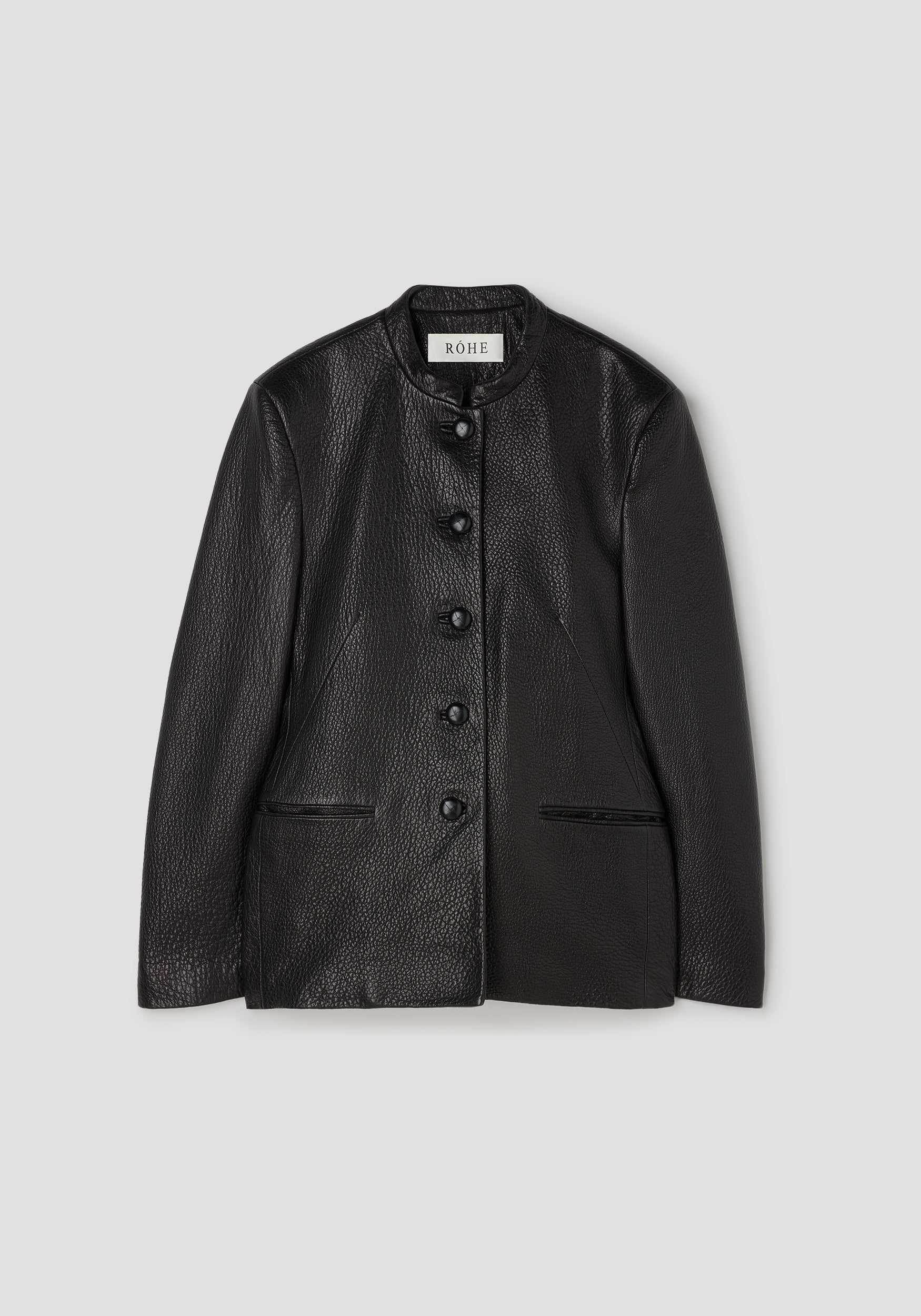 Shaped grain leather jacket | black with a sleek button-up front, mandarin collar, and subtle textured finish, displayed on a neutral background.