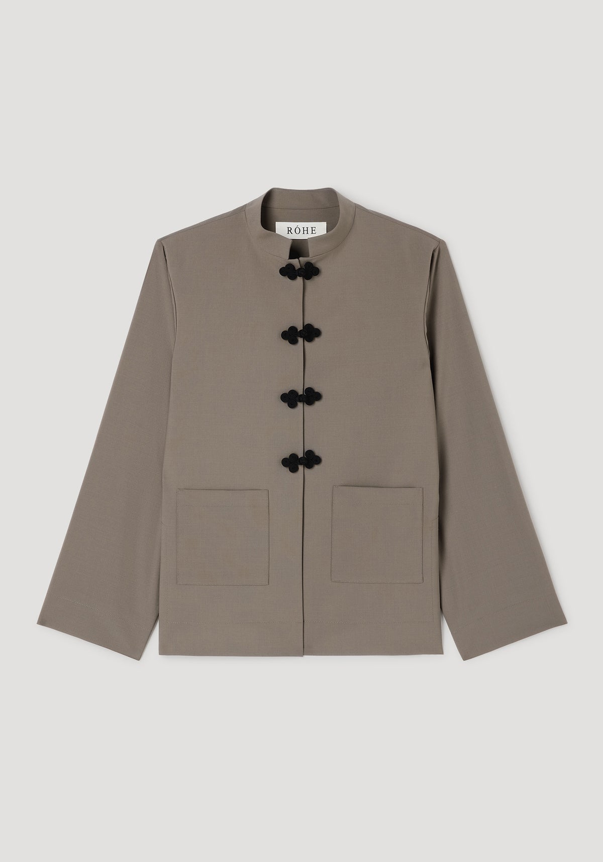 Pankou closure jacket | taupe, taupe jacket with black frog closures, standing collar, long sleeves, and two front patch pockets on a light background