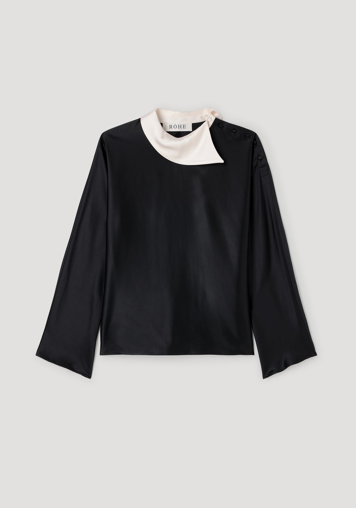 Reimagined collar top | black with long sleeves and a contrasting white collar, displayed against a neutral background