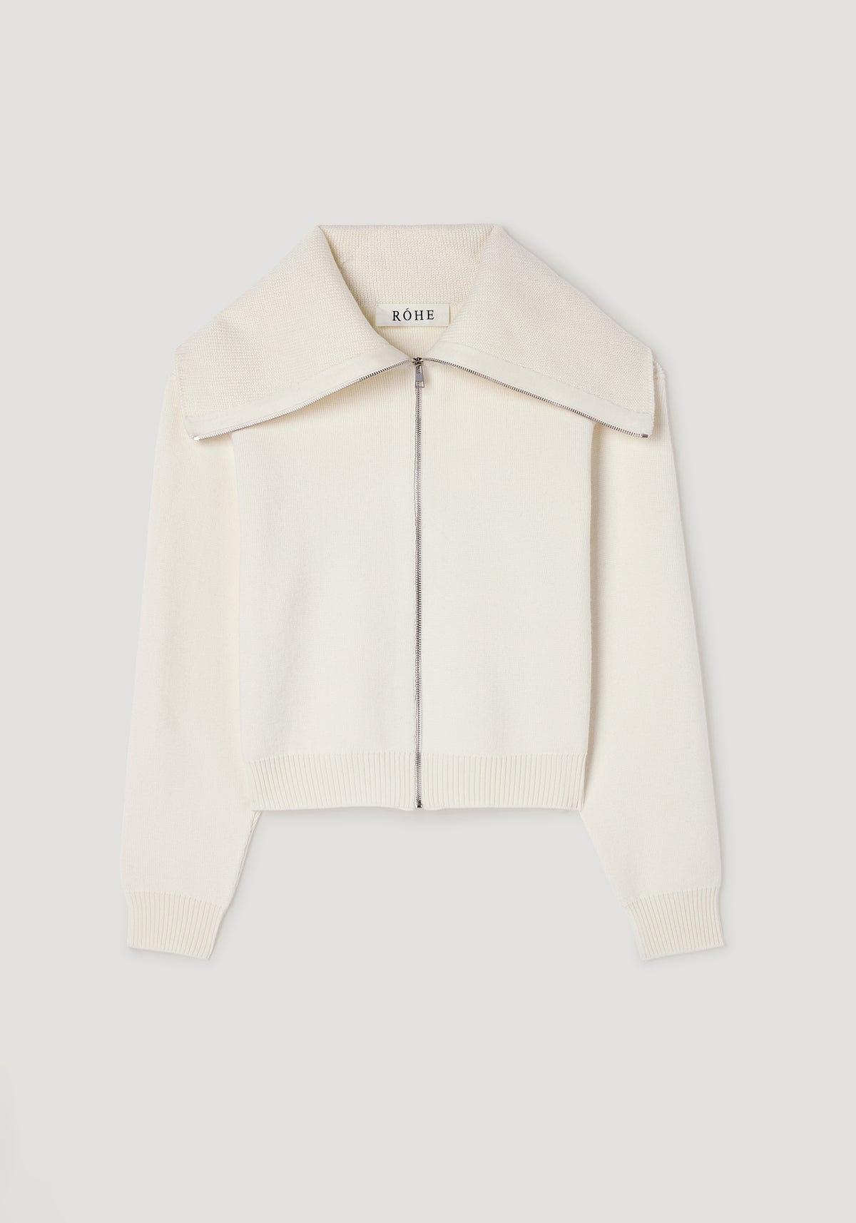 Two way sailor zip cardigan | cream in a soft cream color, featuring a wide sailor collar, full front zipper, and ribbed cuffs and hem.