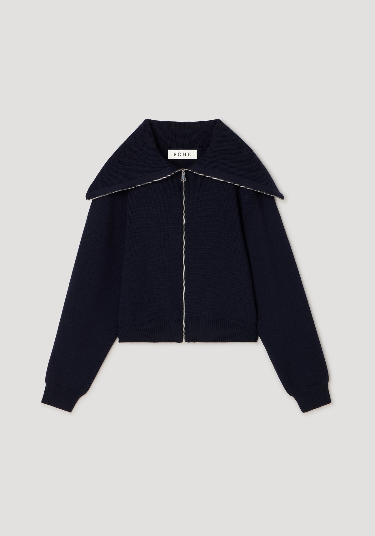 Two way sailor zip cardigan | navy with long sleeves, wide collar, and front zipper closure, displayed flat on a neutral background.