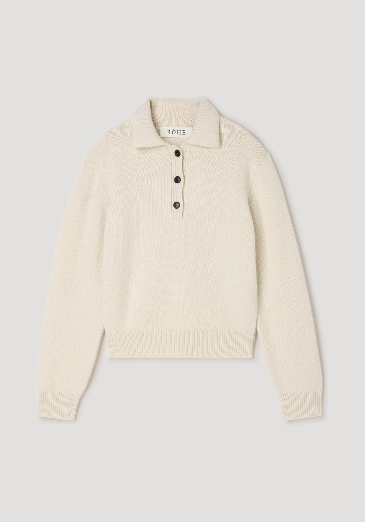 Wool-cashmere polo | cream, a soft cream knit polo sweater with long sleeves, ribbed cuffs and hem, a collared neckline, and three-button placket laid flat