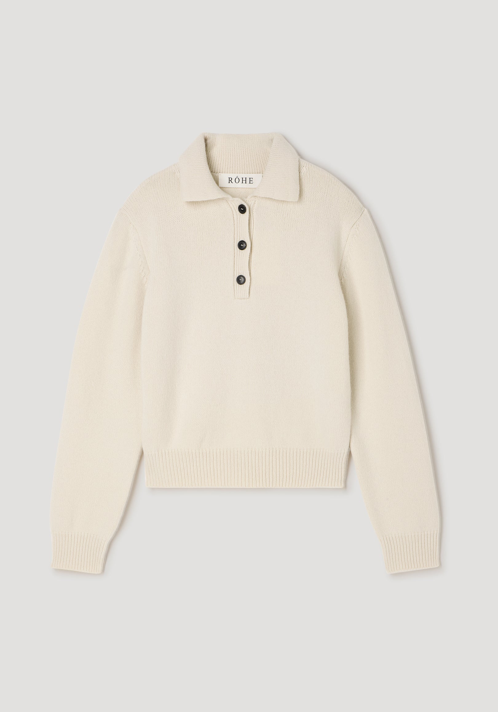 Wool-cashmere polo | cream, a soft cream knit polo sweater with long sleeves, ribbed cuffs and hem, a collared neckline, and three-button placket laid flat