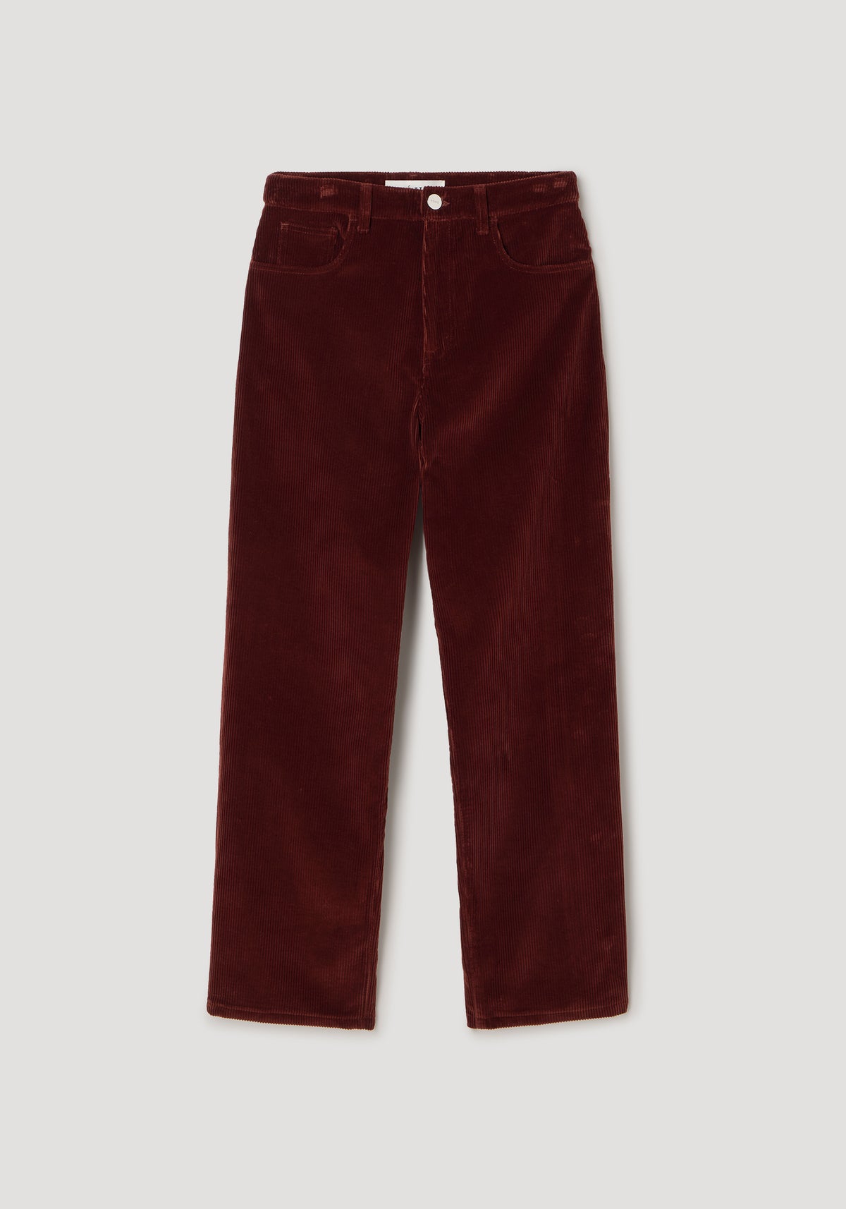 Bruun - Signature baggy corduroy trousers | wine in a rich deep red color, featuring a relaxed baggy fit with visible side pockets and a button closure.