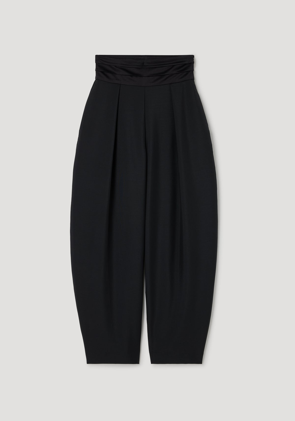 Puck - Sculptural cumberband trousers | black shown flat with a high ruched waistband and wide, tapered legs in a smooth black fabric.