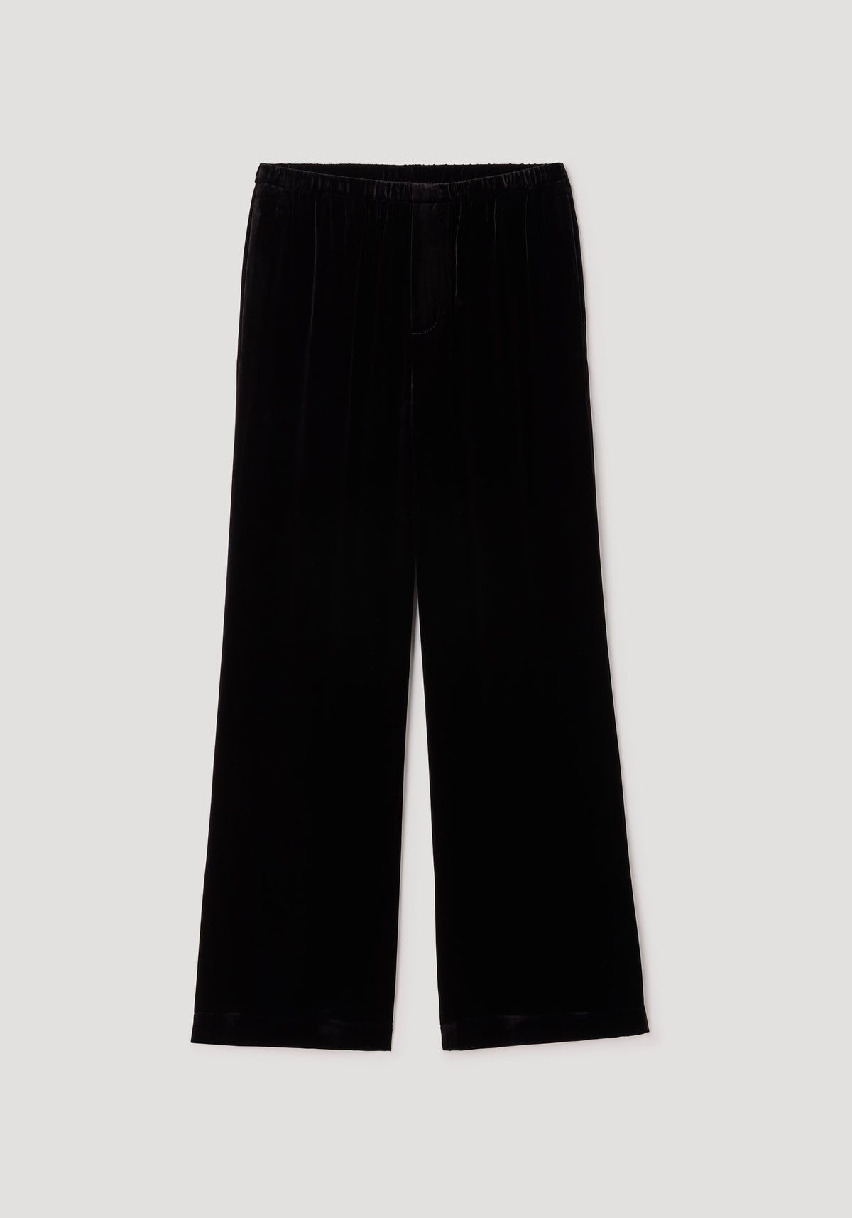 Black wide-leg trousers with a relaxed fit made of soft velvet fabric, featuring an elastic waistband for comfortable wear, labeled as Velvet relaxed trousers | black.