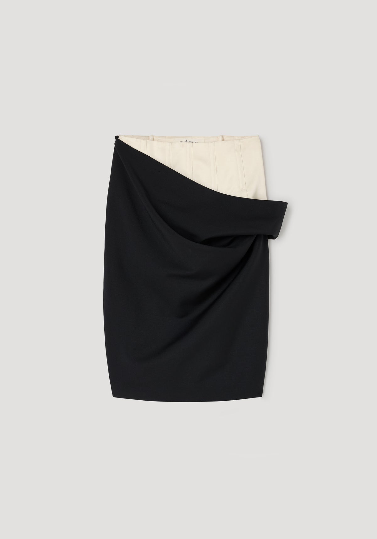 Double waistband skirt | black shown flat with a draped black outer layer partially revealing a beige inner waistband.