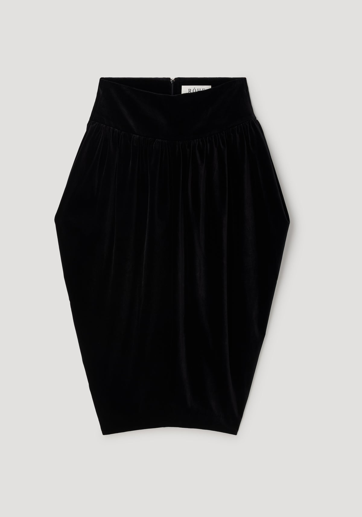 Sculptural volume velvet skirt | black, shown flat with a high waistband, gathered pleats, and a rounded sculptural silhouette.