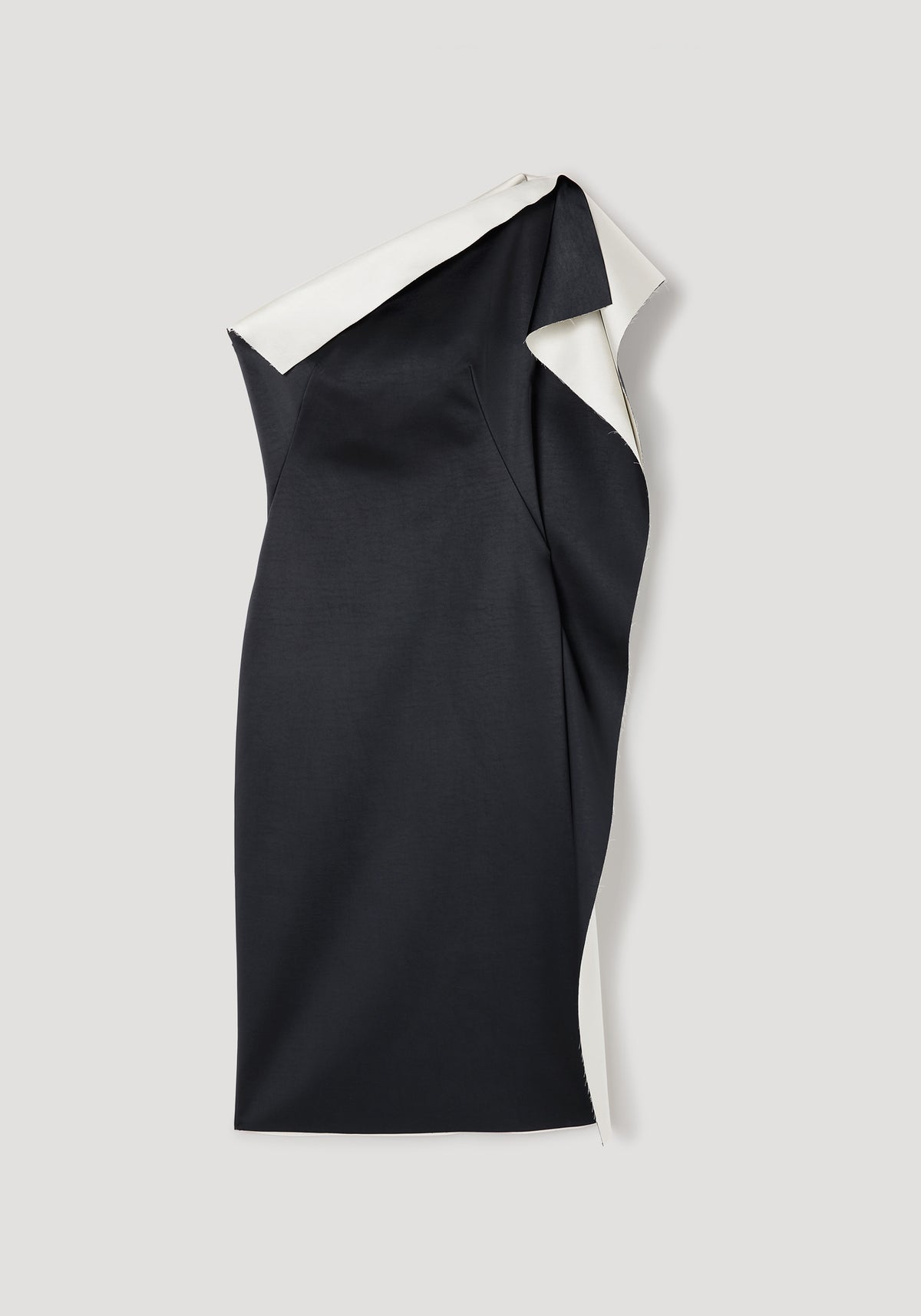 Sleek black and white sculptural double-satin off-shoulder dress | black/white laid flat, showcasing its asymmetrical design and elegant draping.