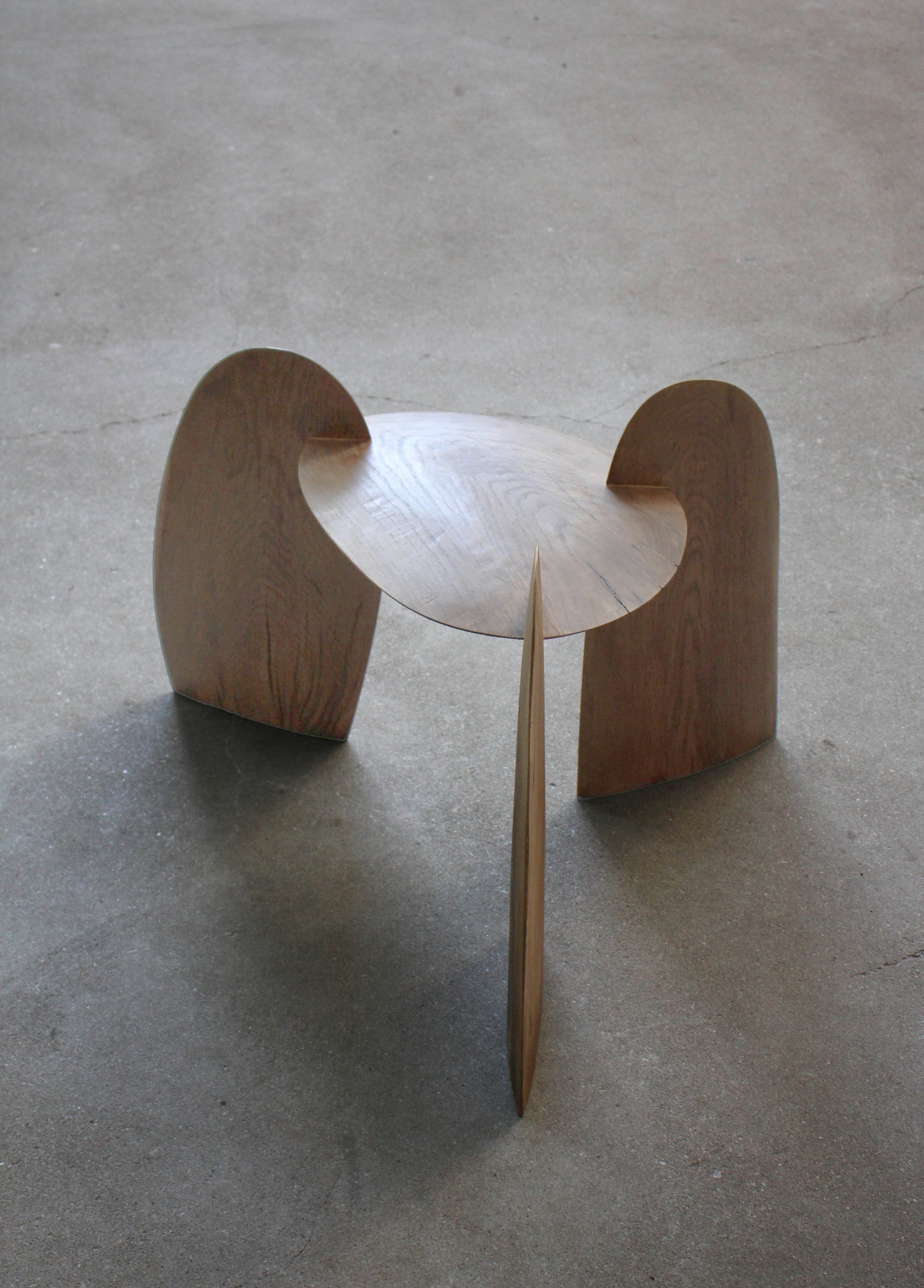 Sculpted Stool | 4673: A handcrafted, interlocking oak wood stool by Arne Kristian, featuring a dish-shaped top and biophilic design. 70cm H x 55cm W x 50cm D.