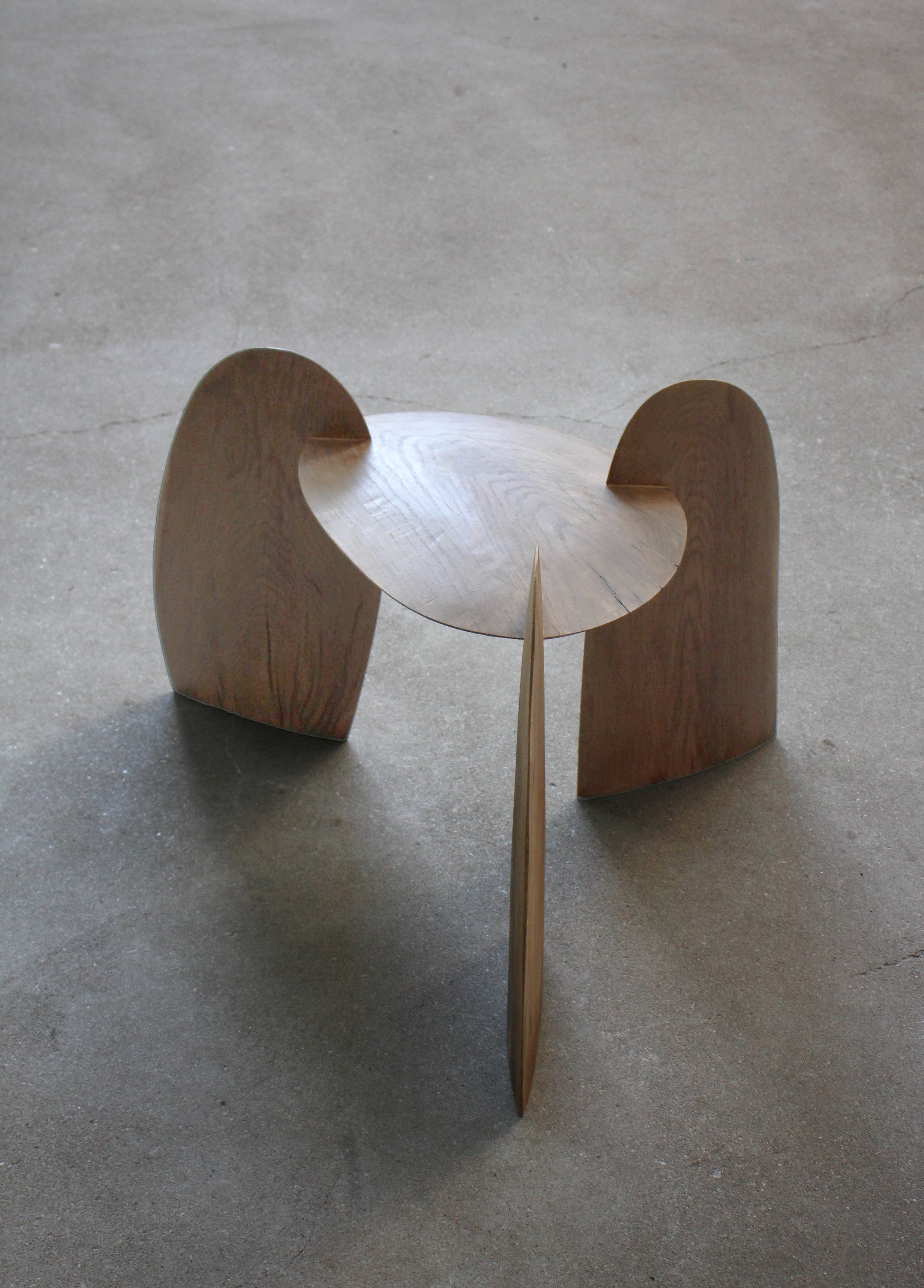 Sculpted Stool | 4673: A handcrafted, interlocking oak wood stool by Arne Kristian, featuring a dish-shaped top and biophilic design. 70cm H x 55cm W x 50cm D.