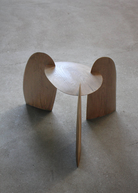 Sculpted Stool | 4673: A handcrafted, interlocking oak wood stool by Arne Kristian, featuring a dish-shaped top and biophilic design. 70cm H x 55cm W x 50cm D.