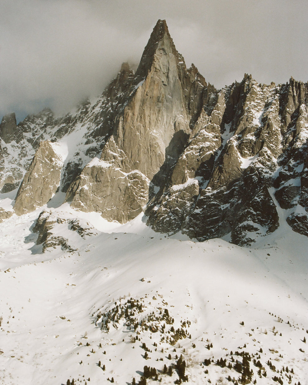Mountain peak with snow at the bottom