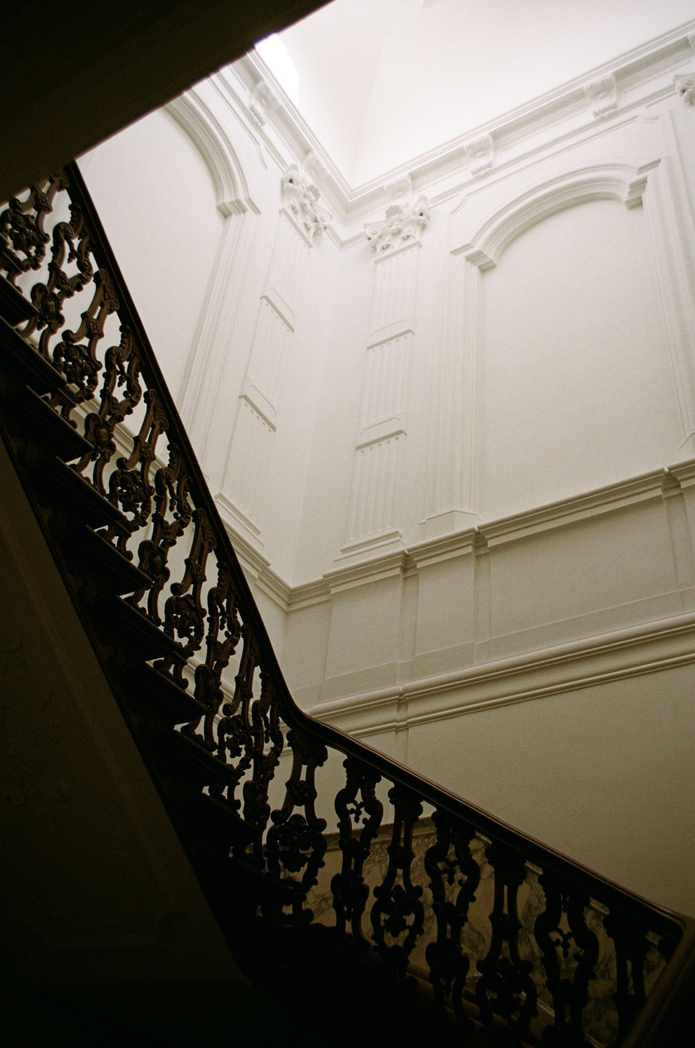 Staircase with ornate railing