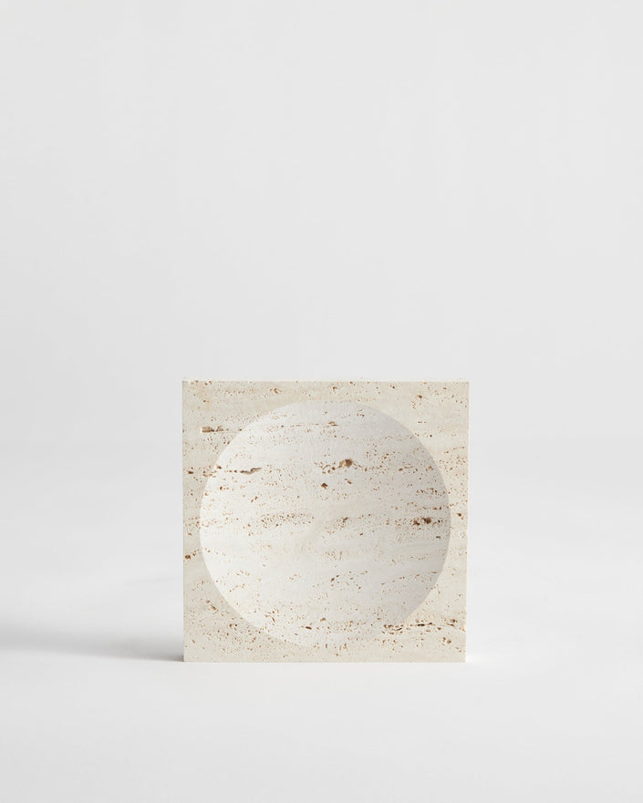 Small tray | travertine: Square stone tray with a round indent, handcrafted from leftover travertine by Dutch artist Louis Crombag, showcasing minimalist design.