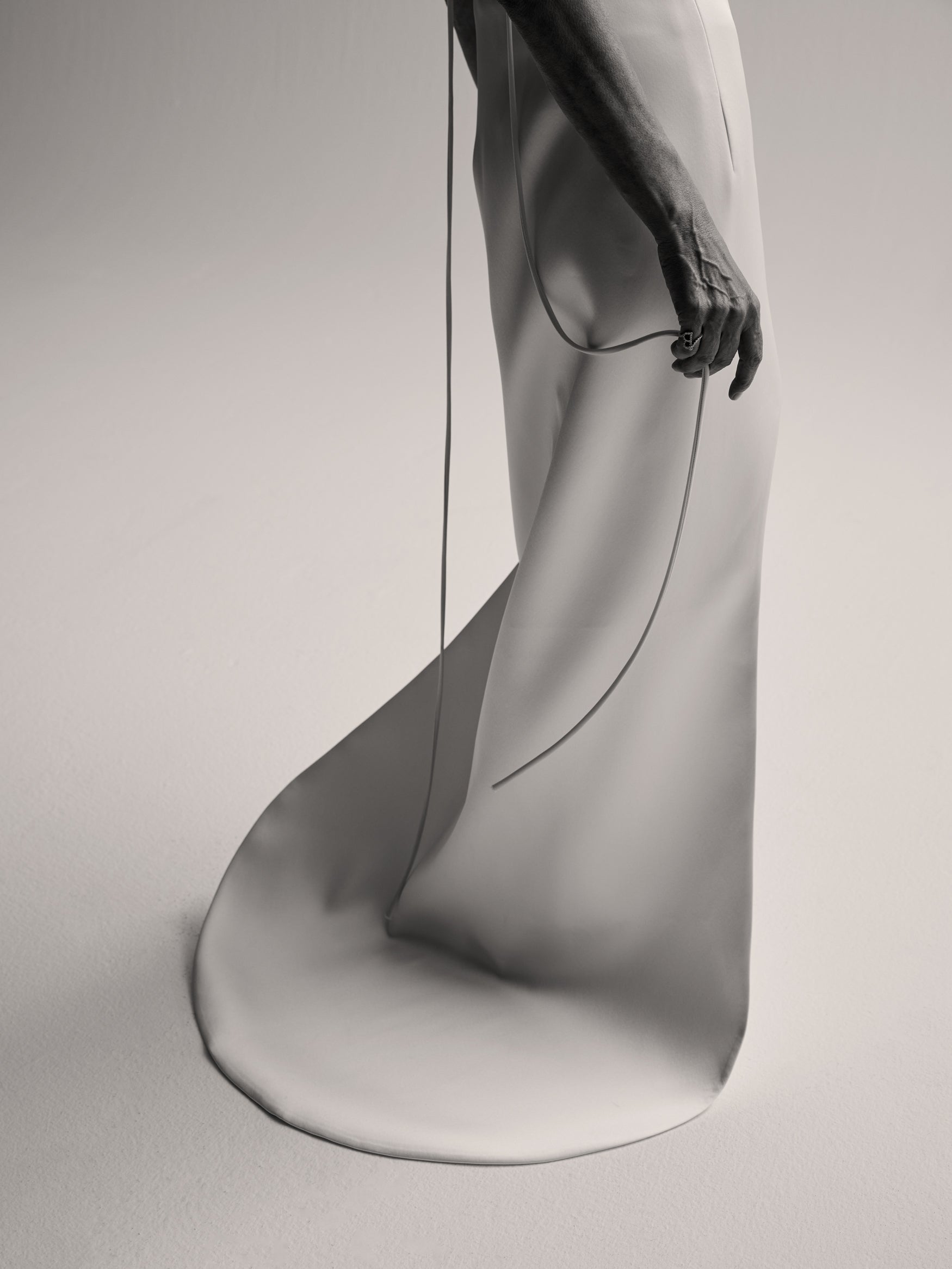 Image of the train of a white dress.