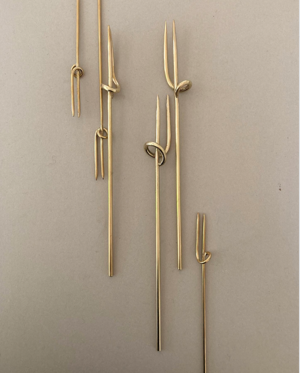 Five handcrafted Vine Forks with double tines and knot detail, designed by Misae Nikkei, symbolizing nature's inspiration and artisanal craftsmanship from Kyoto.