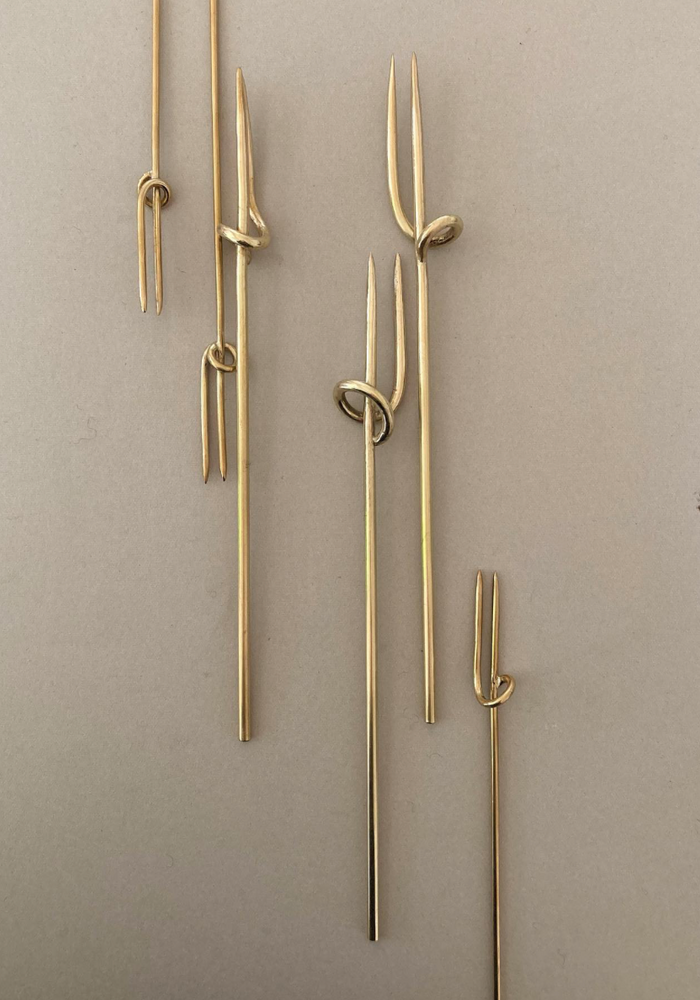 Five handcrafted Vine Forks with double tines and knot detail, designed by Misae Nikkei, symbolizing nature's inspiration and artisanal craftsmanship from Kyoto.